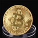 Ozdobna moneta ze znakiem Bitcoinu
